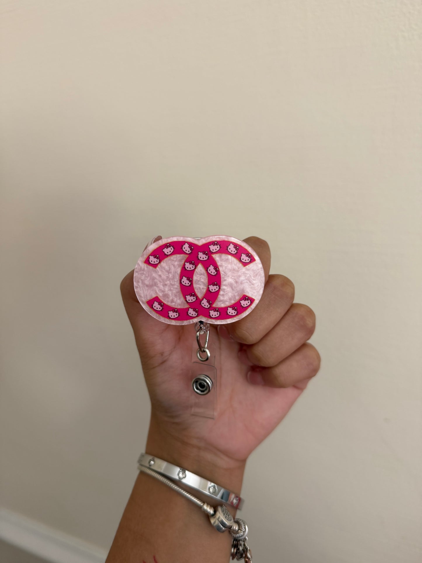 Chanel badge reel