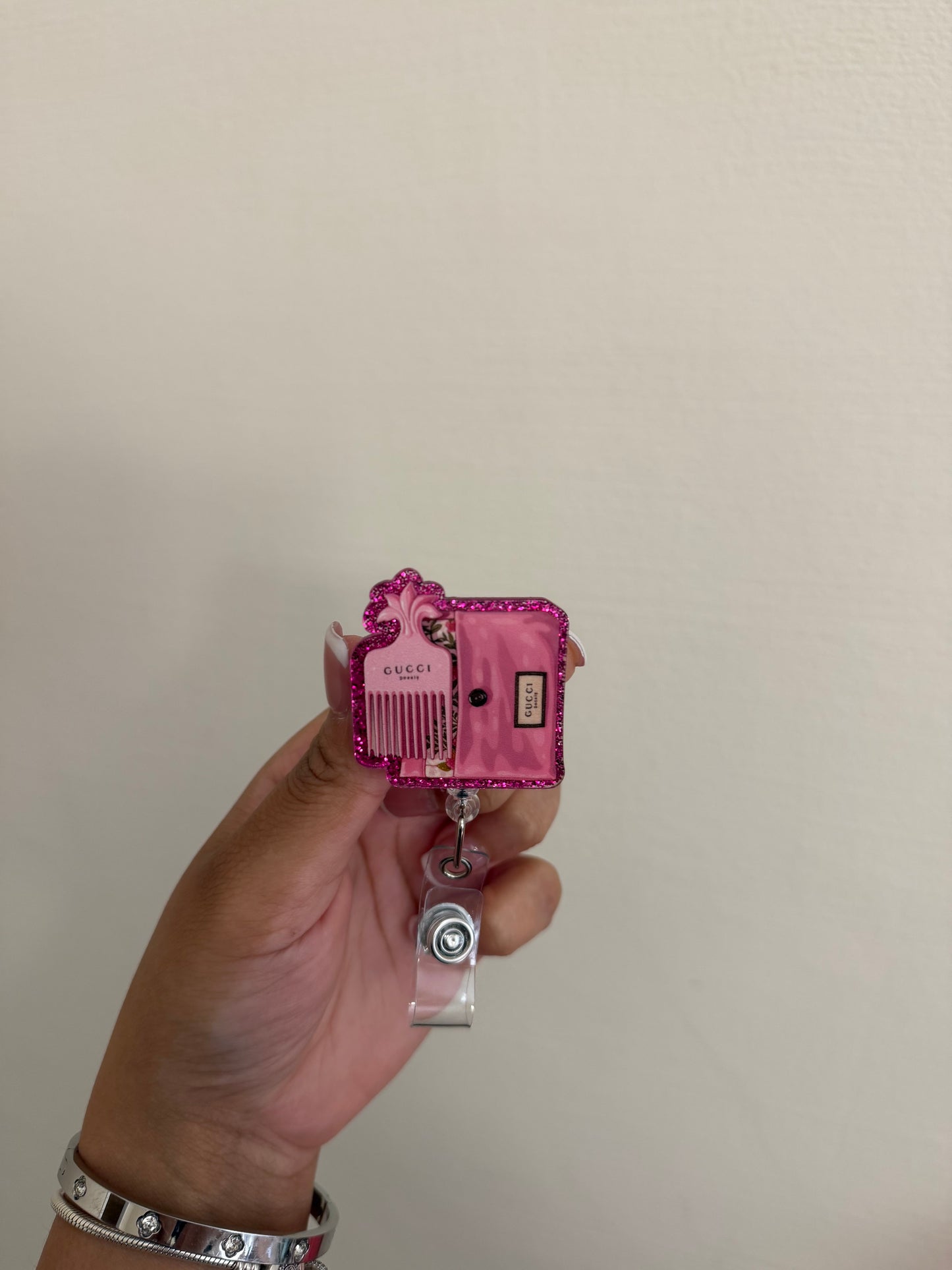 Gucci badge reel