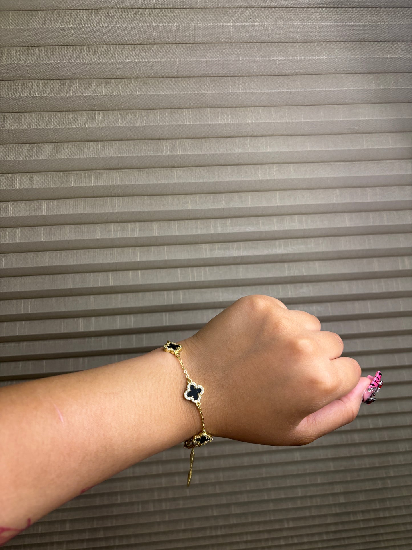 Gold and black clover bracelet