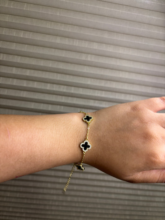 Gold and black clover bracelet