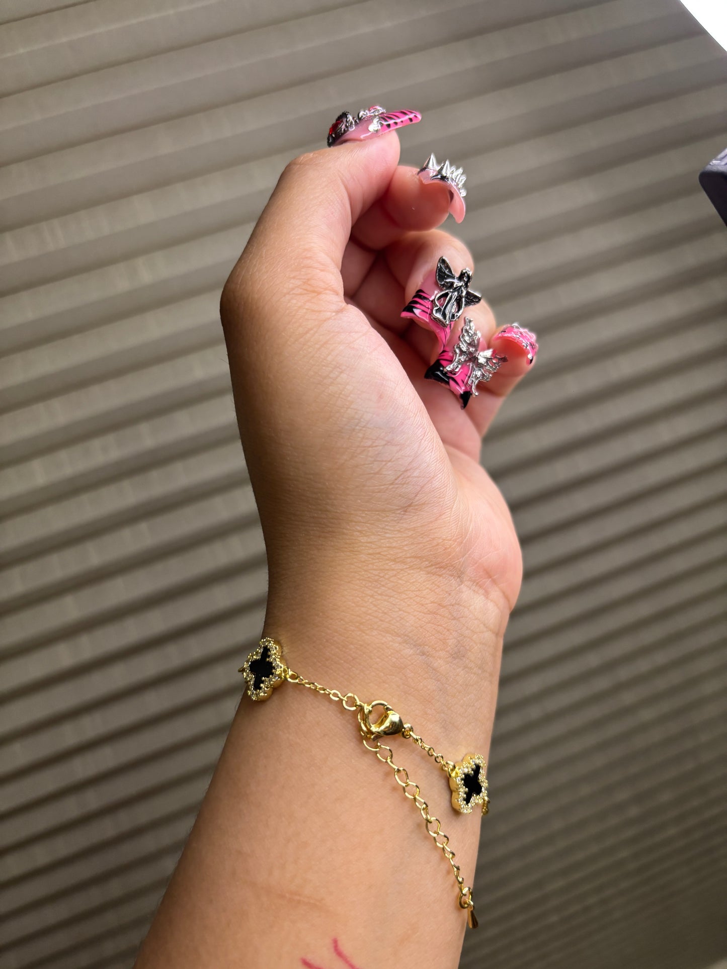 Gold and black clover bracelet