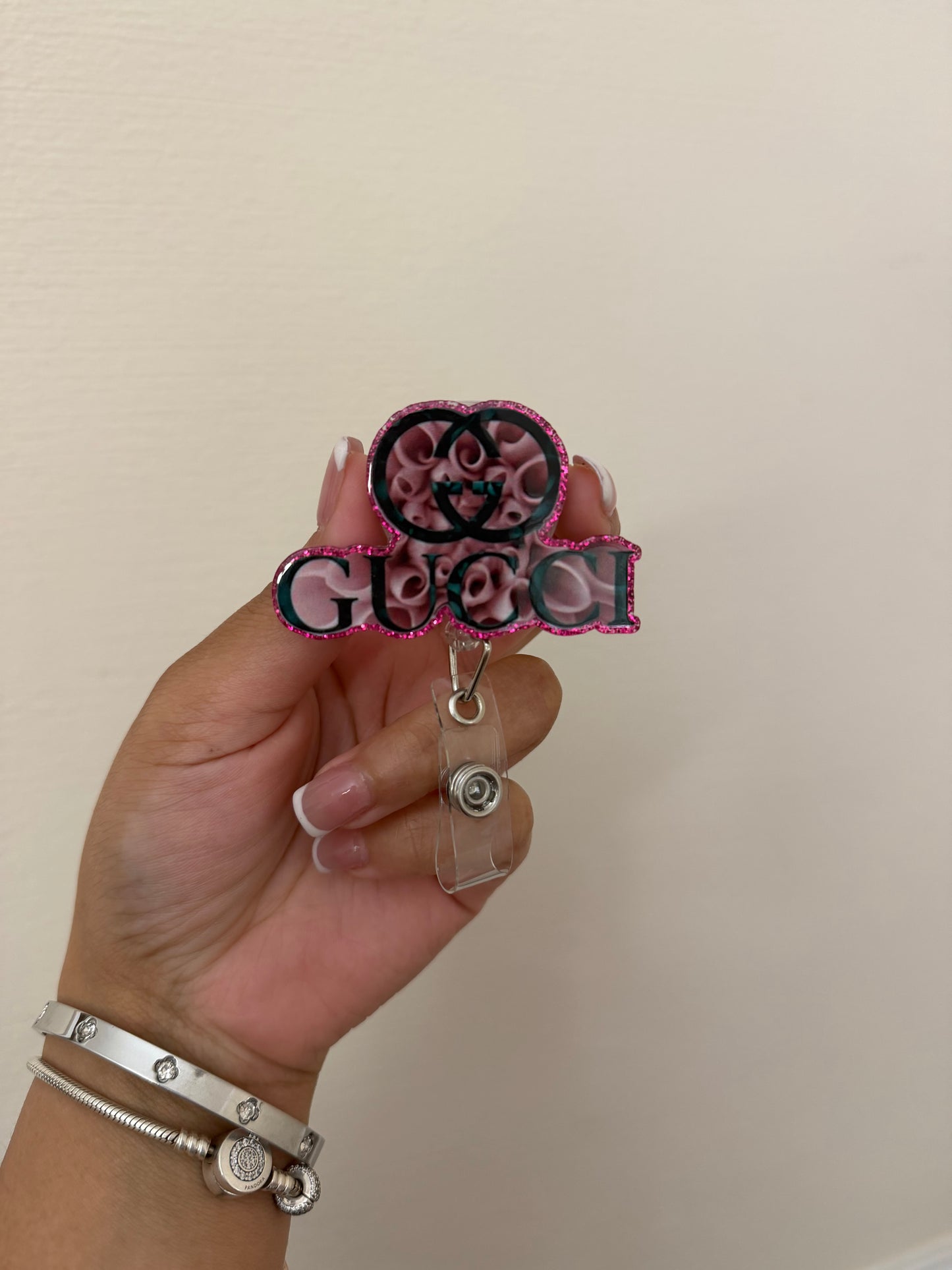 Gucci badge reel